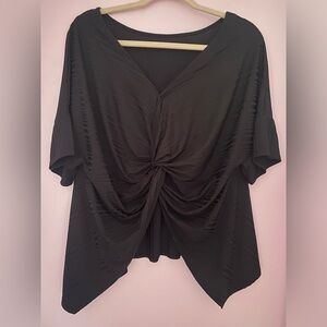 Entro high low top with semi open back. Black size large.